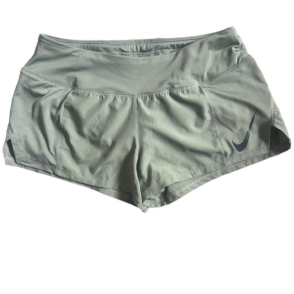 Green Nike running shorts